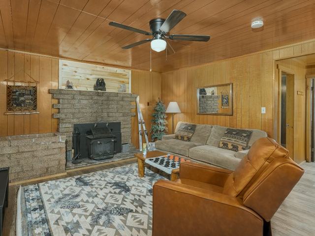 Panda Bear cabin living room with a stone fireplace