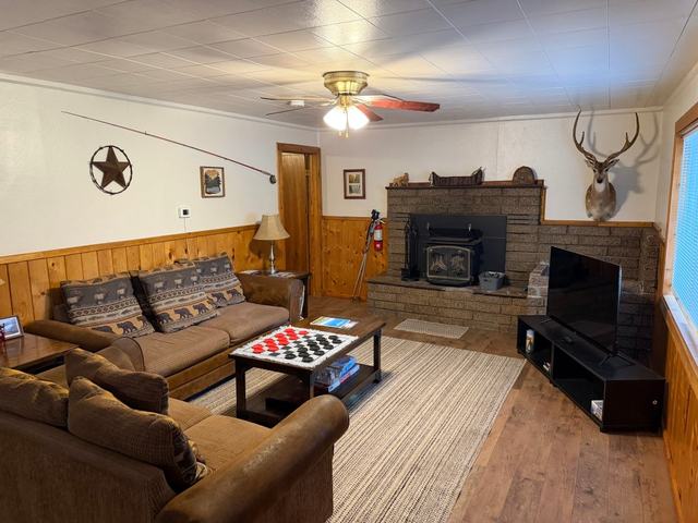 Polar Bear cabin living room with a brick fireplace
